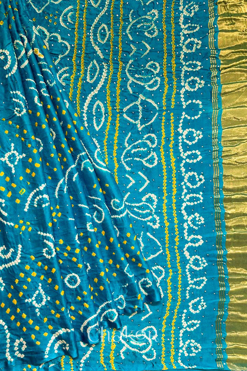 Pleated view of Peacock Blue Bandhani Gaji Silk Saree, handcrafted with rai bandhej patterns and mukaish embroidery.