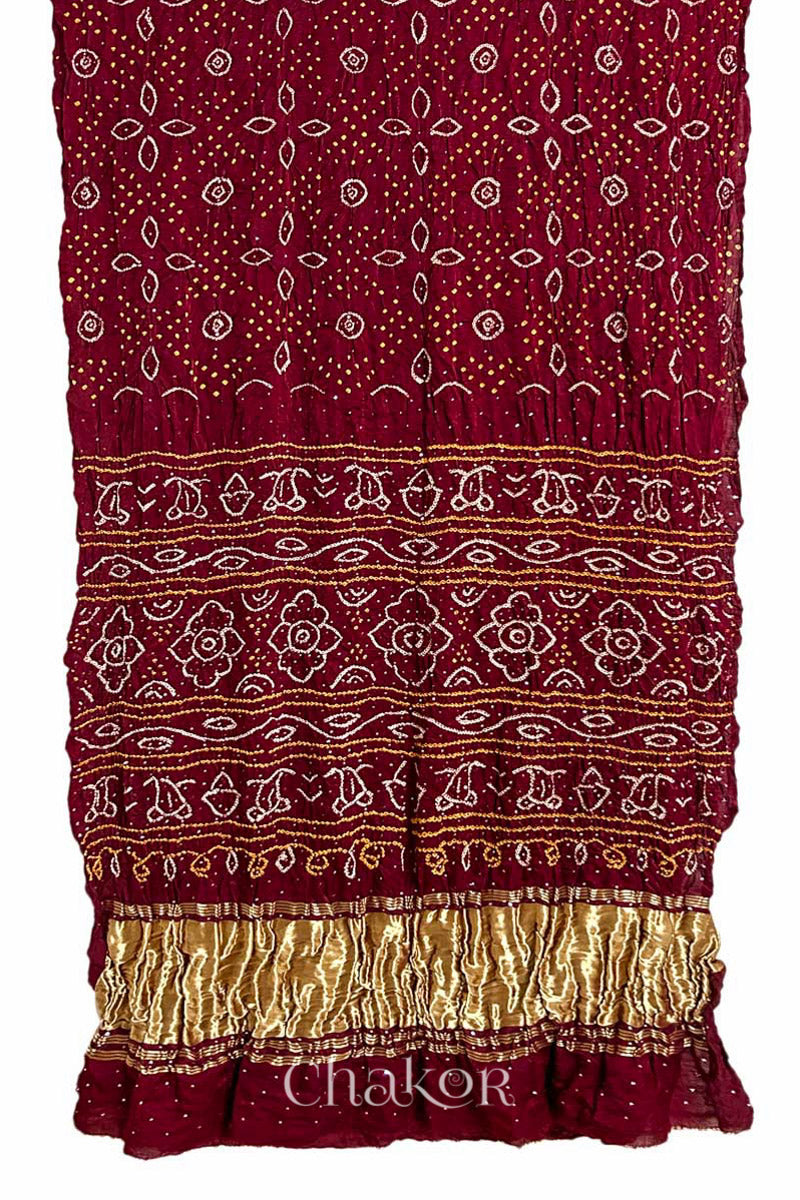 Full view of Handcrafted Maroon Bandhani Gaji Silk Saree with traditional rai bandhej patterns and mukaish embroidery.