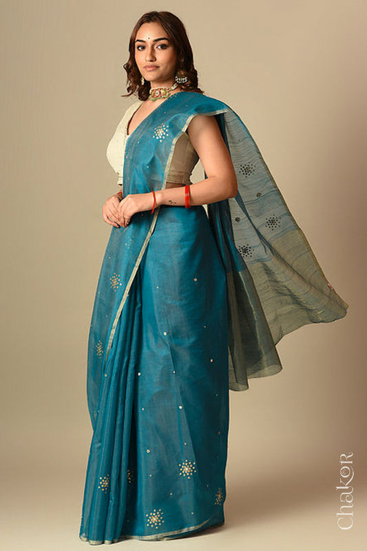 Chakor's Traditional Peacock Blue Chanderi silk cotton saree with sequins embroidery.
