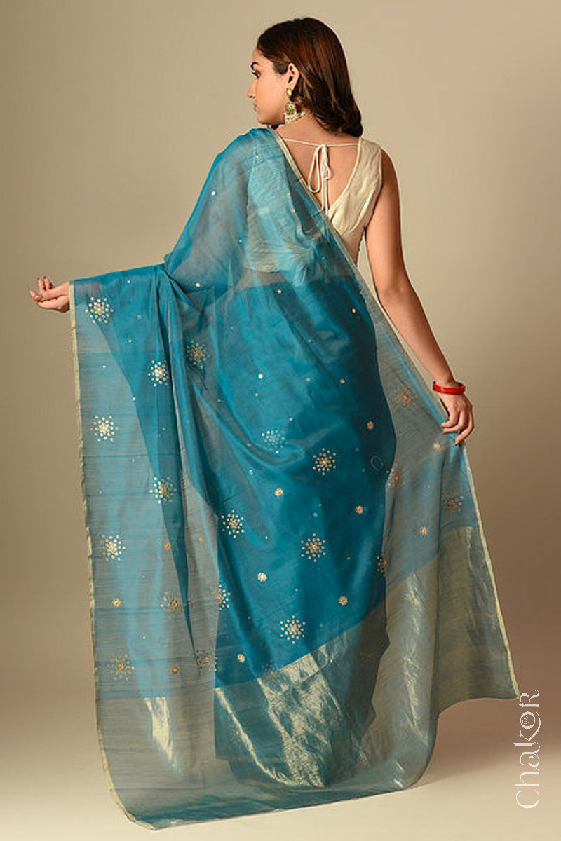 Chakor's Traditional Peacock Blue Chanderi silk cotton saree with sequins embroidery.