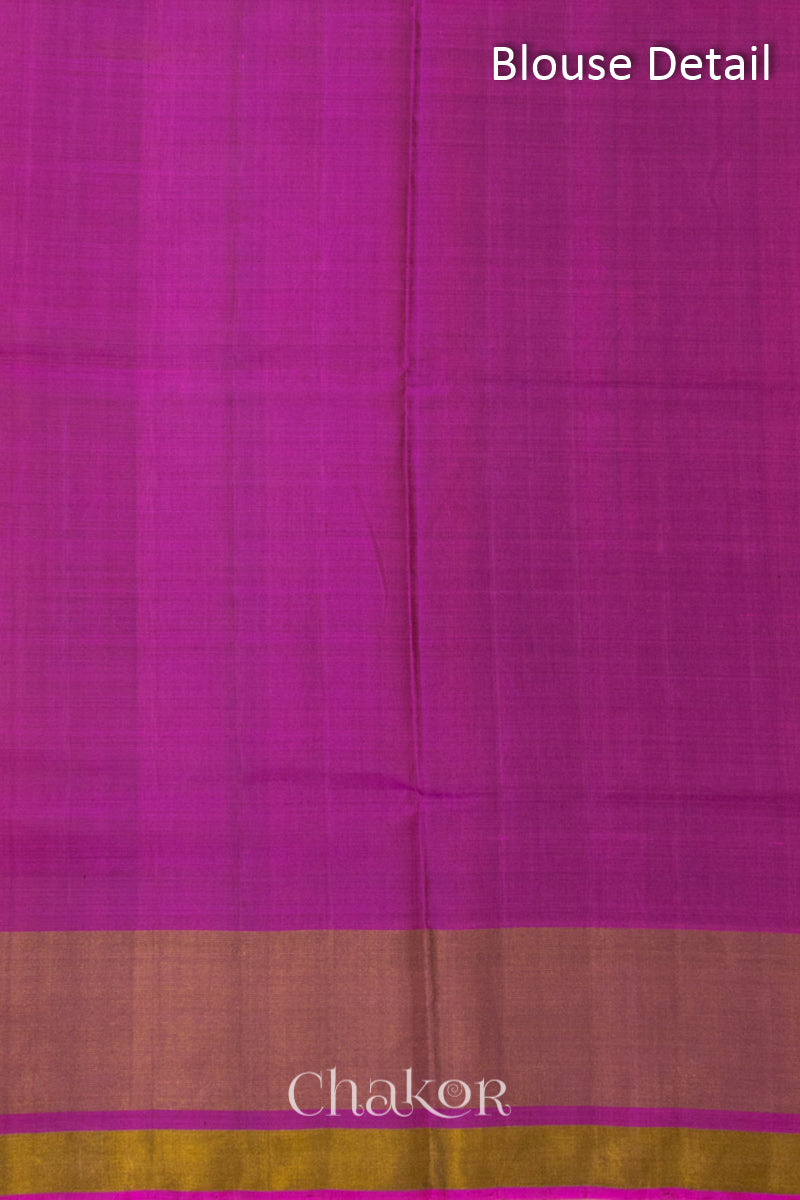 Blouse detail of Handloom Magenta Pink Rajkoti Patola Ikat Mulberry Silk Saree with tissue borders, woven using traditional designs in Gujarat.