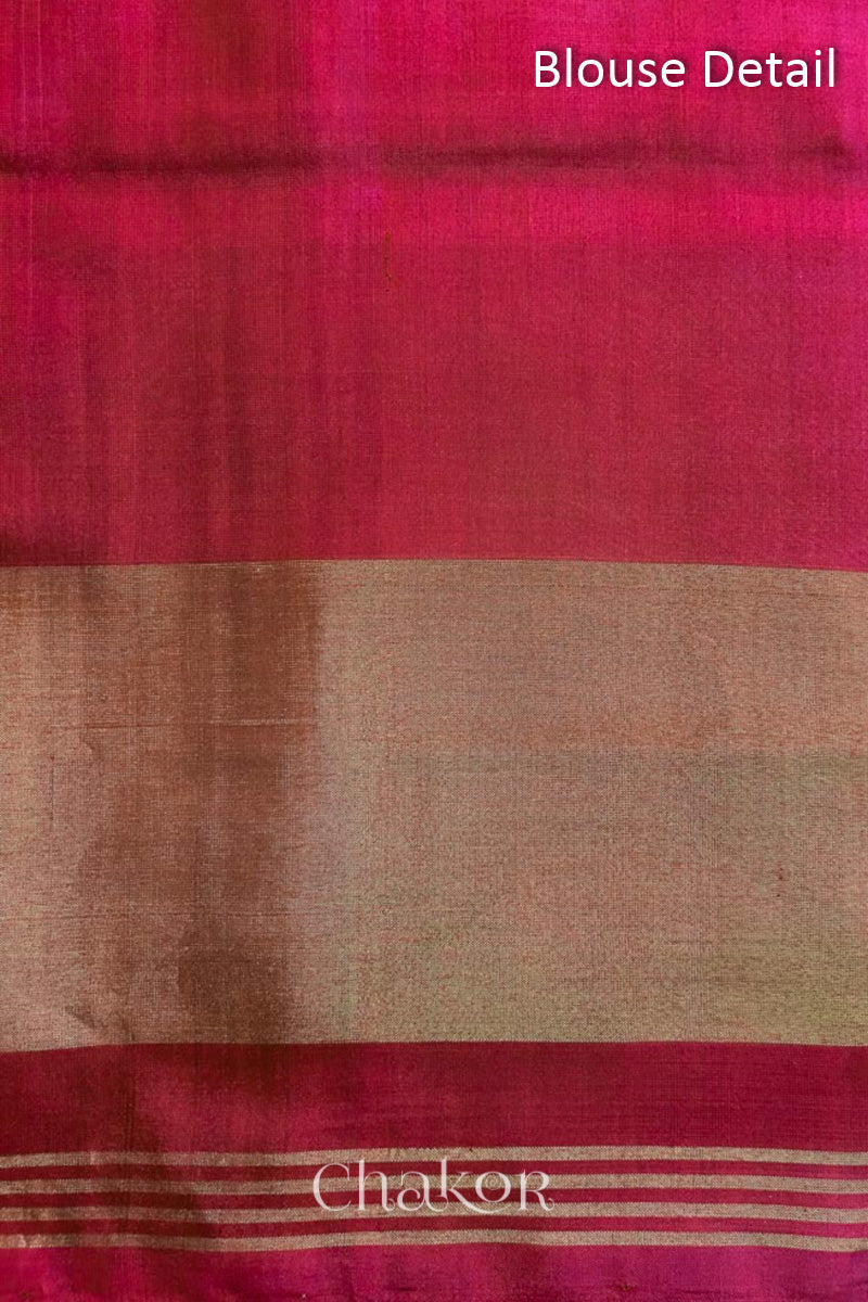 Blouse piece of Handloom Green Rajkoti Patola Ikat Mulberry Silk Saree with red border pallu, woven using traditional designs in Gujarat.