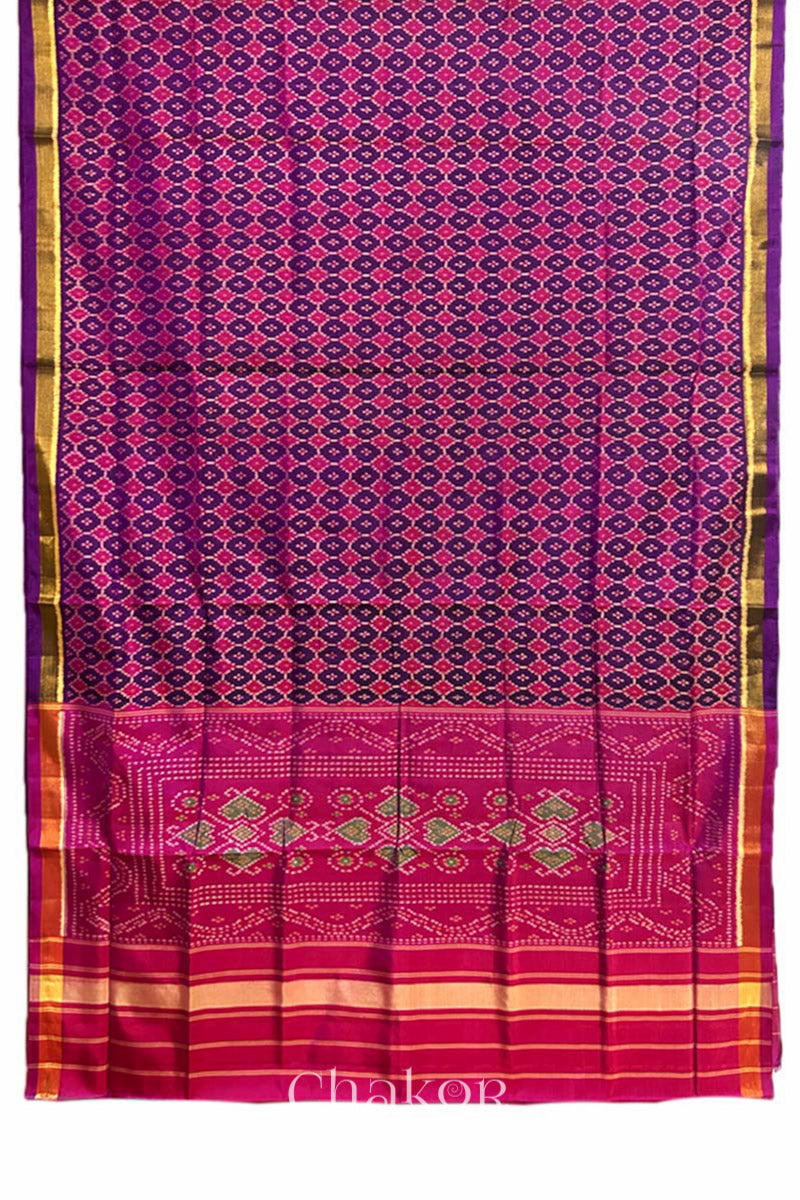 Full view of of Handloom Purple Pink Patola Ikkat Mulberry Silk Saree in traditional patterns.