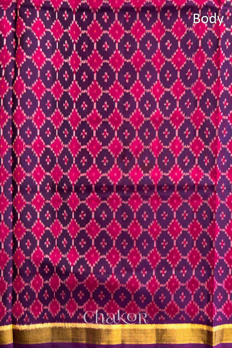 Body detail of Handloom Purple Pink Patola Ikkat Mulberry Silk Saree in traditional patterns.