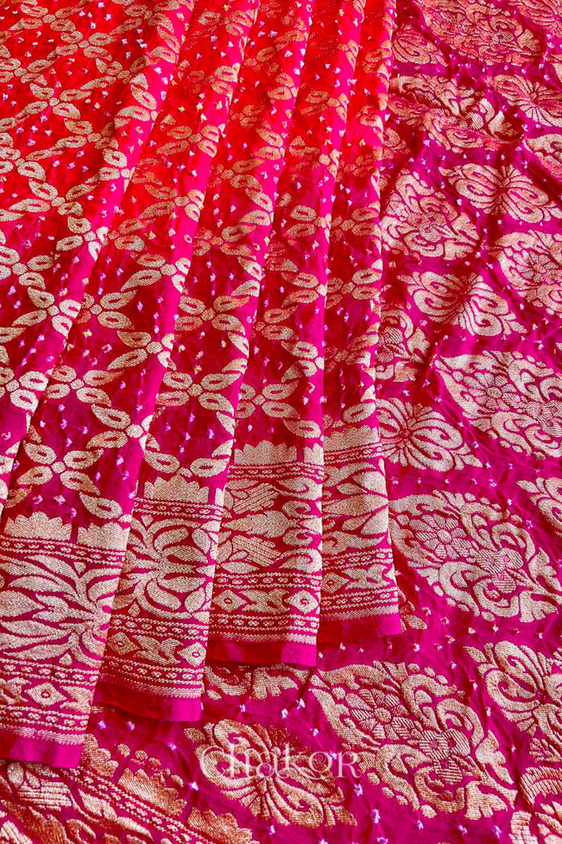 Handcrafted Pink and peach ombre shaded Bandhani Banarasi Georgette Silk Saree featuring zari weaving and Kutch Bandhej.
