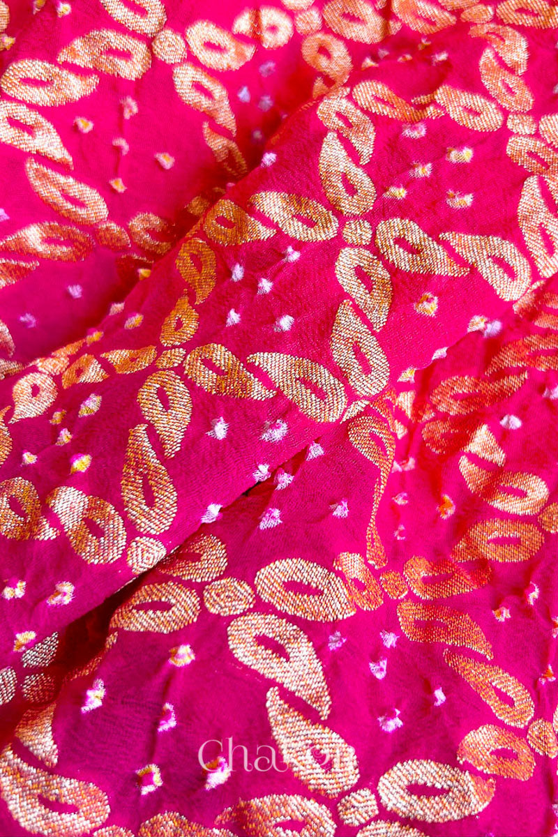 Handcrafted Pink and peach ombre shaded Bandhani Banarasi Georgette Silk Saree featuring zari weaving and Kutch Bandhej.