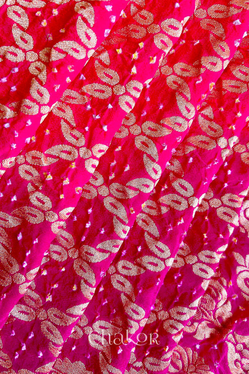 Handcrafted Pink and peach ombre shaded Bandhani Banarasi Georgette Silk Saree featuring zari weaving and Kutch Bandhej.