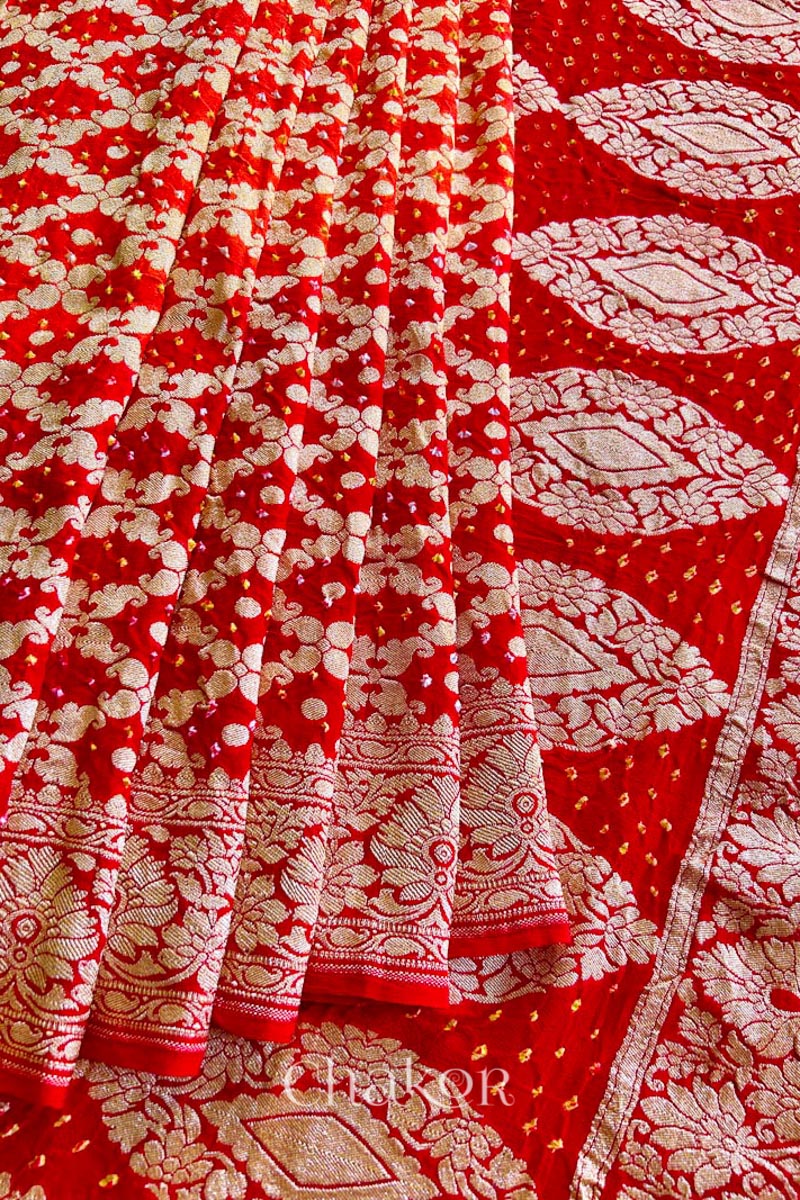 Chakor's traditional Orange Red banarasi silk bandhej handloom saree with Mukaish embroidery