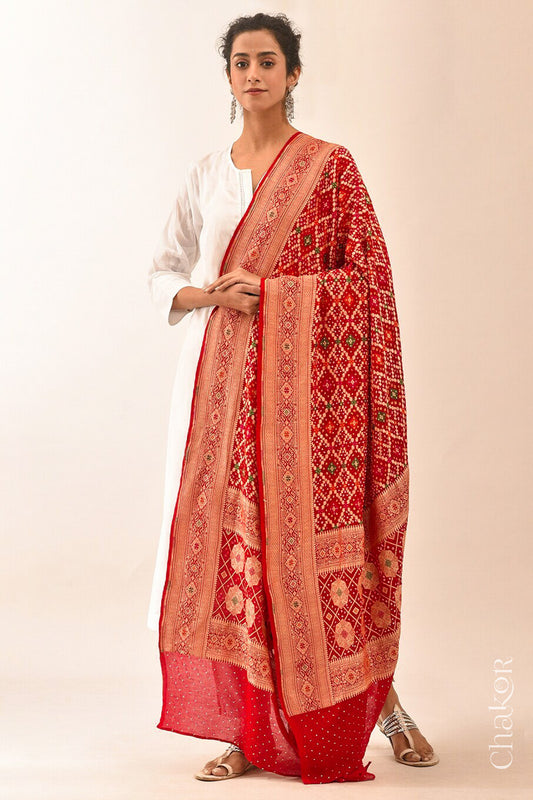 Chakor's Traditional Red Bandhani Banarasi Georgette Silk Dupatta embellished with mukaish work.
