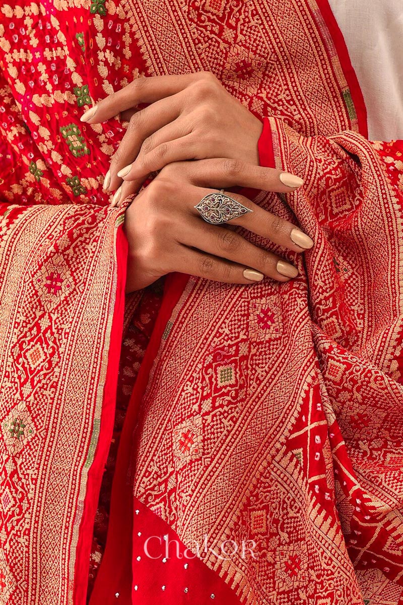 Chakor's Traditional Red Bandhani Banarasi Georgette Silk Dupatta embellished with mukaish work.