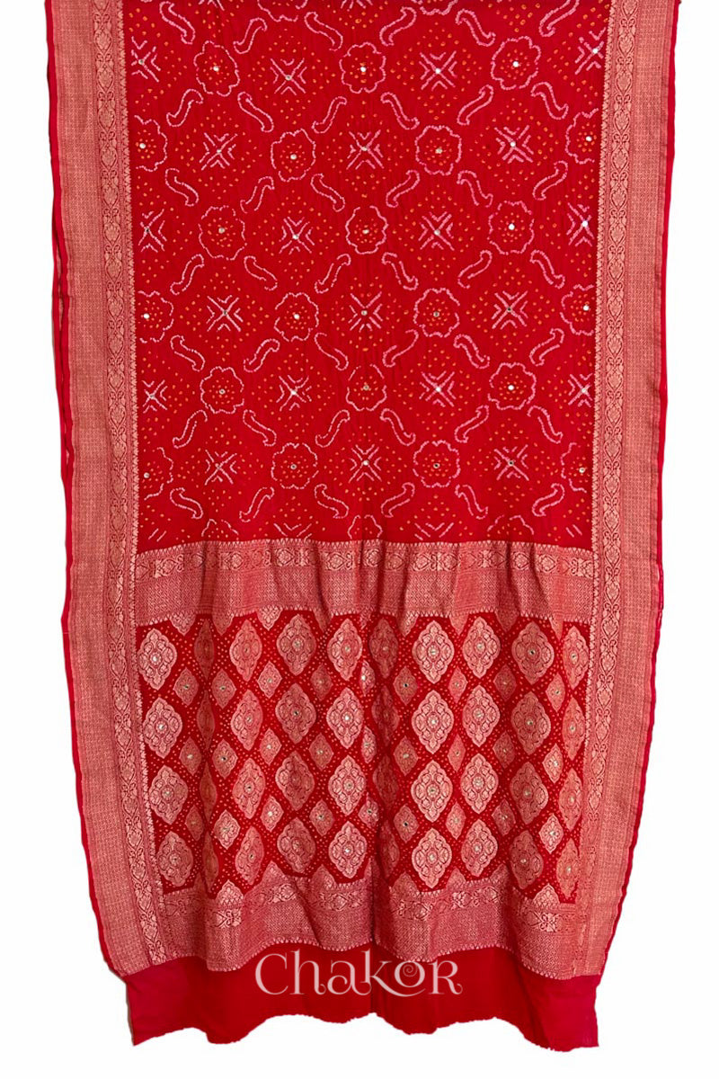 Full view of  Handcrafted Red Bandhani Banarasi Georgette Saree in pure silk featuring zari weaving and Kutch Bandhej with mirror embroidery, Perfect for wedding and occasions.