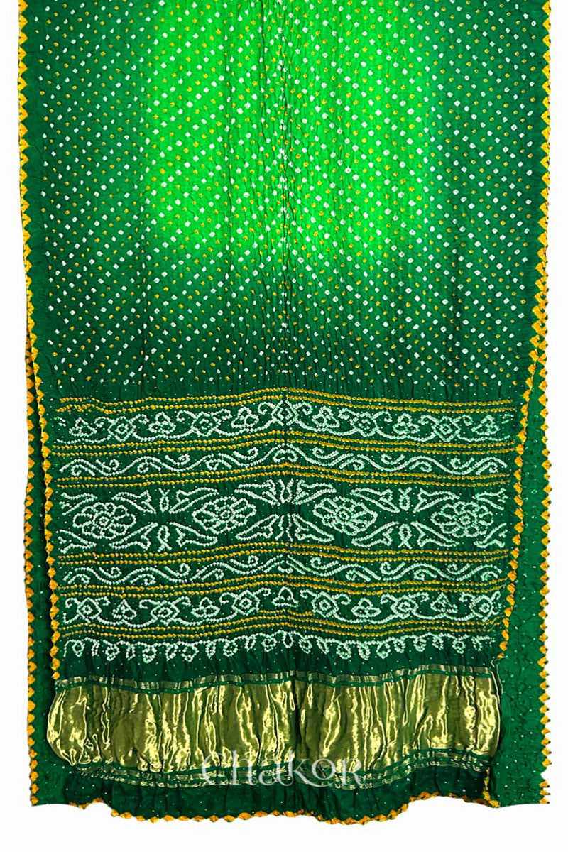 Full view of Handcrafted Parrot and green ombre Bandhani Gaji Silk Saree with traditional bandhej patterns and mukaish embroidery.