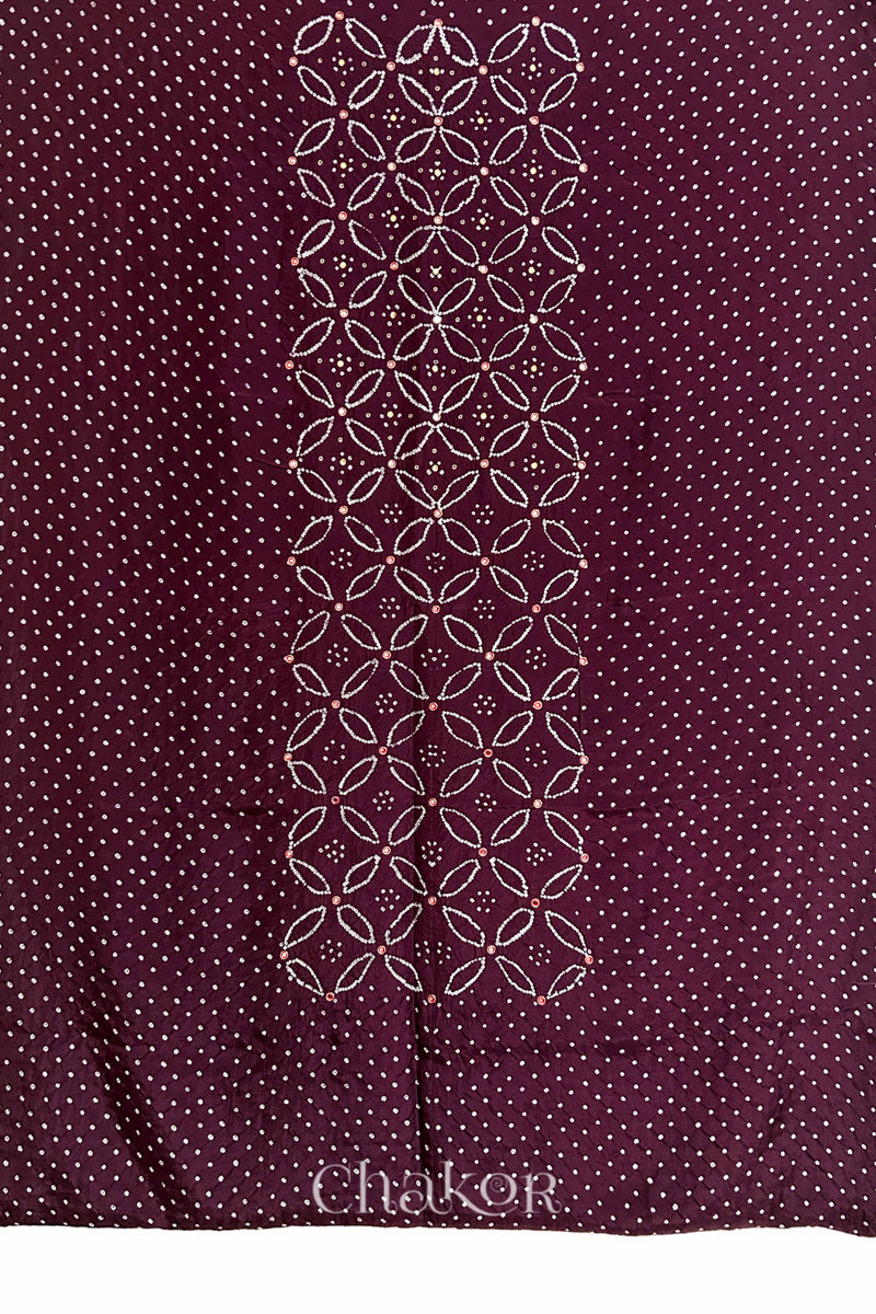 Full fabric panel of Maroon mulberry silk Bandhani (Rai Bandhej) with all-over white dots and a floral border with red with zari mirror & sequins embroidery – CHAKOR.
