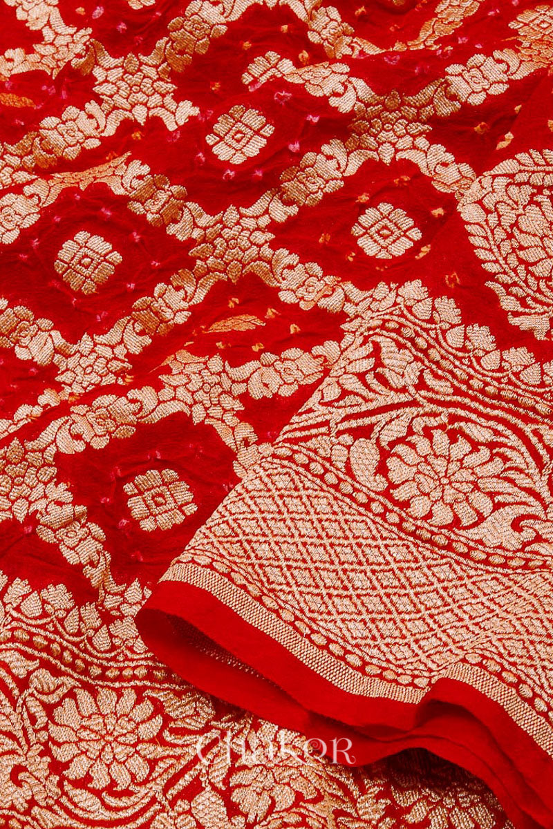 Chakor's Handcrafted Red Bandhani Banarasi Georgette Silk Saree featuring zari weaving and Kutch rai bandhej.