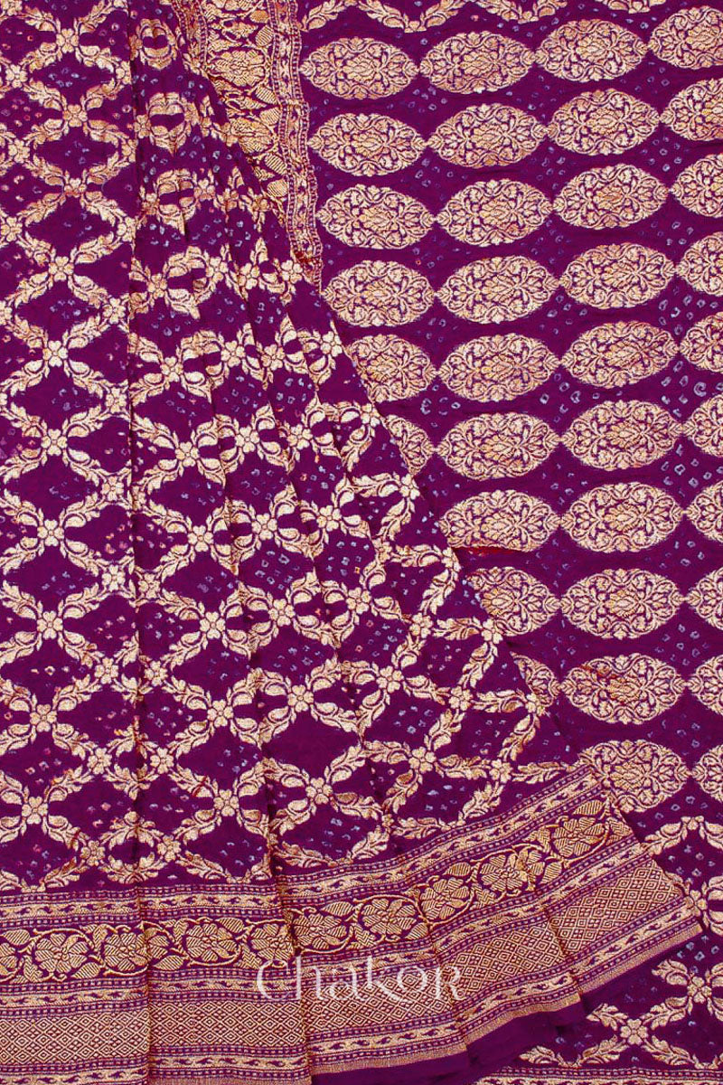 Close up of Handcrafted Purple Bandhani Banarasi Georgette Saree in pure silk featuring zari weaving and Kutch Bandhej for weddings and occasions.