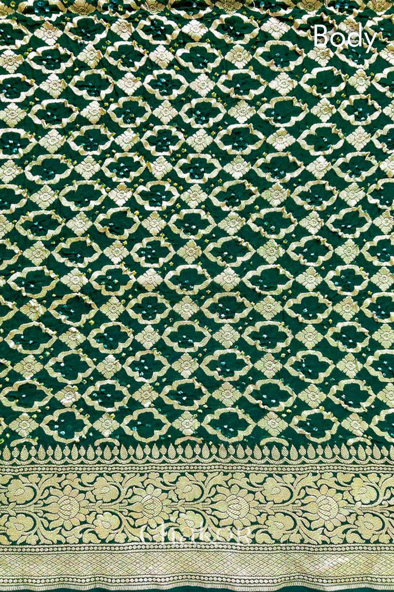 Close up of Handcrafted Green Bandhani Banarasi Georgette Saree in pure silk featuring zari weaving and Kutch Bandhej for weddings and occasions.