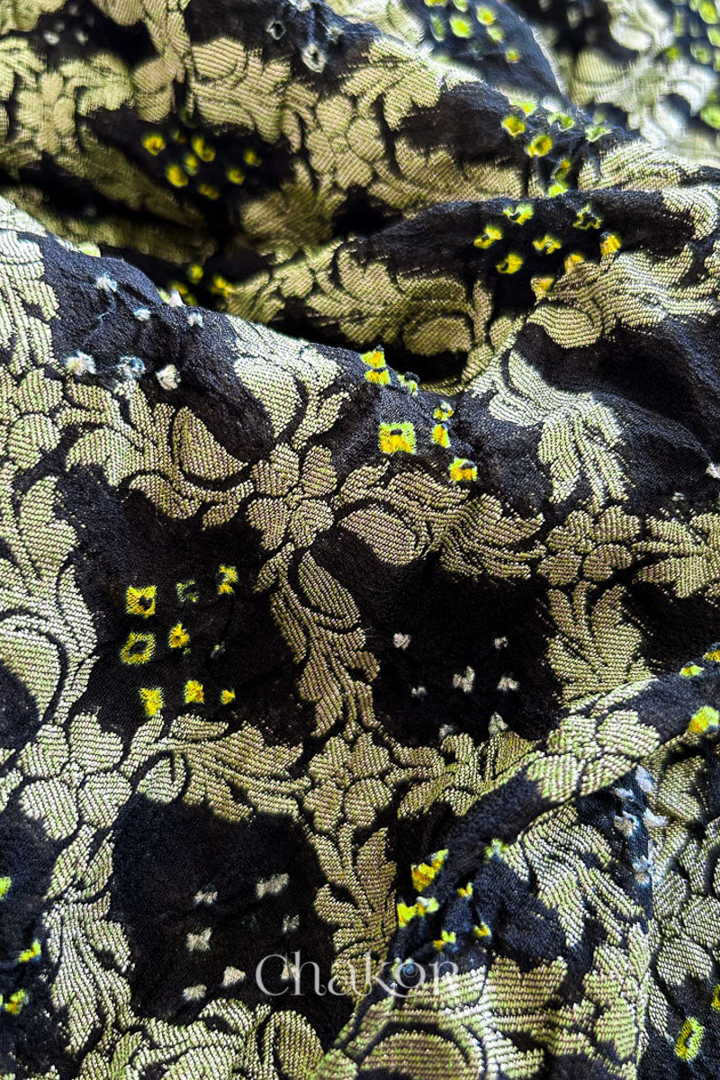 Close up of Handcrafted Black Bandhani Banarasi Georgette Saree in pure silk featuring zari weaving and Kutch Bandhej for weddings and occasions.
