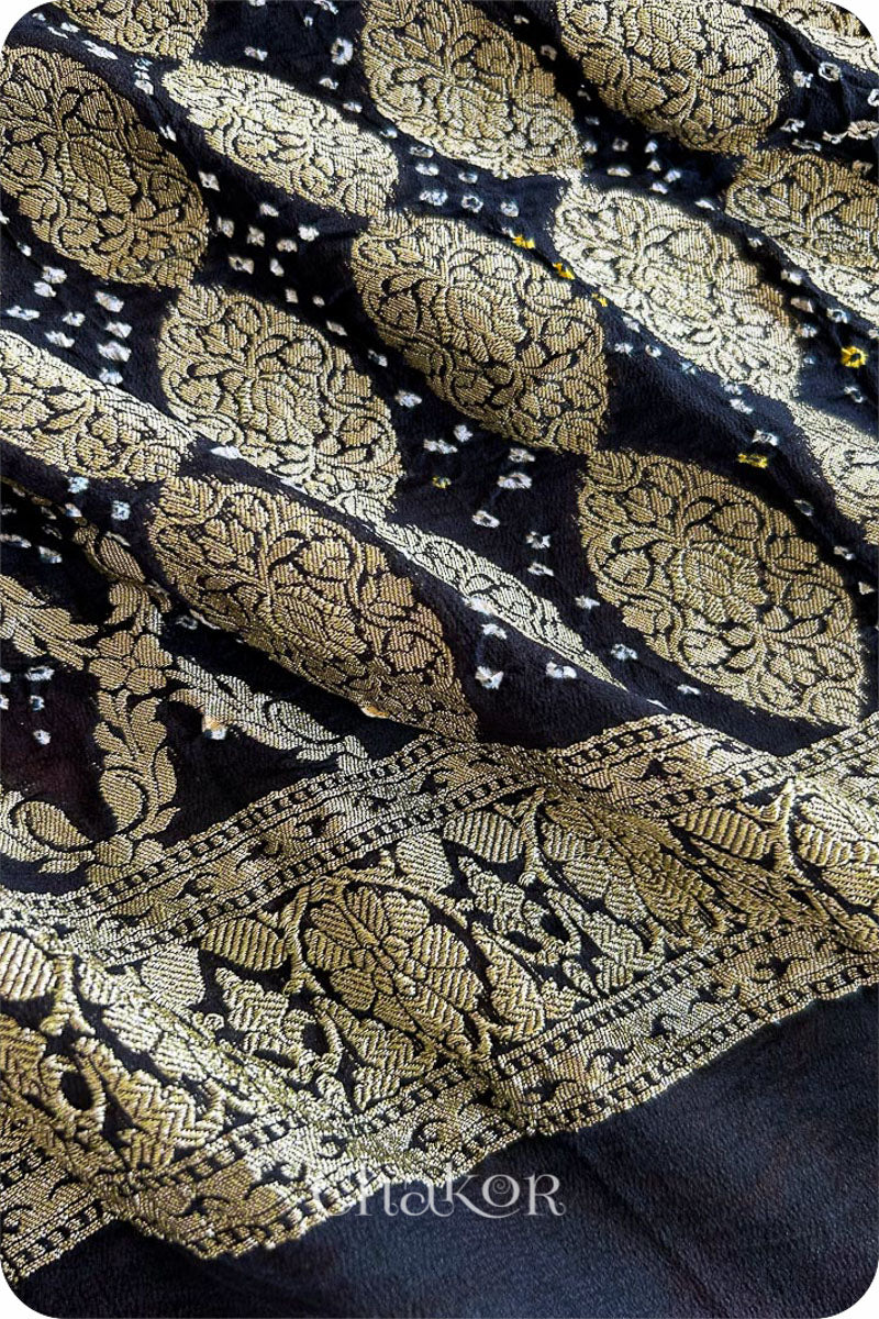 Close up of Handcrafted Black Bandhani Banarasi Georgette Saree in pure silk featuring zari weaving and Kutch Bandhej for weddings and occasions.