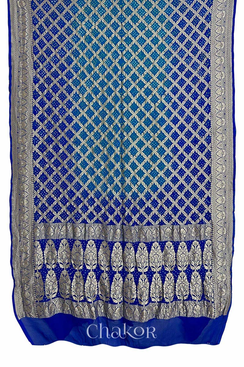 Full view of Handcrafted Peacock Blue  Bandhani Banarasi Georgette Silk Saree featuring zari weaving and Kutch rai bandhej.