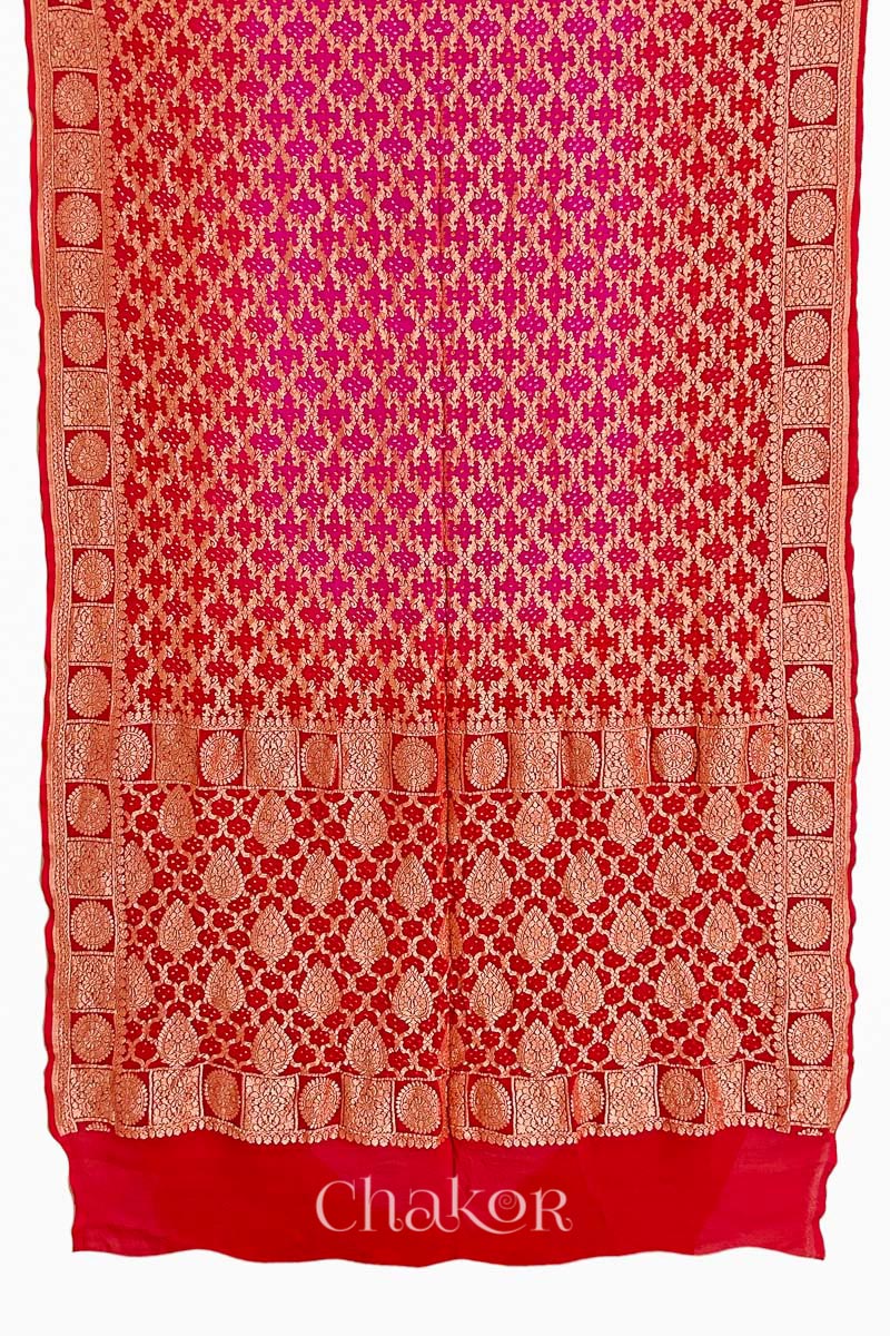 Full view of Handcrafted Pink Red ombre shaded Bandhani Banarasi Georgette Saree in pure silk featuring zari weaving and Kutch Bandhej for weddings and occasions.