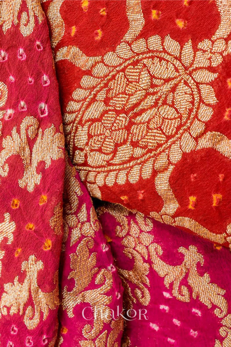 Close up of blouse of f Handcrafted Pink Red ombre shaded Bandhani Banarasi Georgette Saree in pure silk featuring zari weaving and Kutch Bandhej for weddings and occasions.
