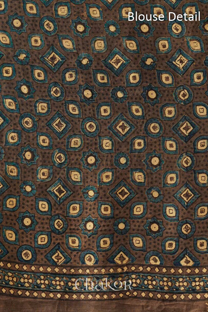 Blouse material of Peacock Blue Bandhani Saree with Brown Ajrakh printed border and pallu in pure gaji silk with traditional bandhej tie-dye, handcrafted in Kutch. 