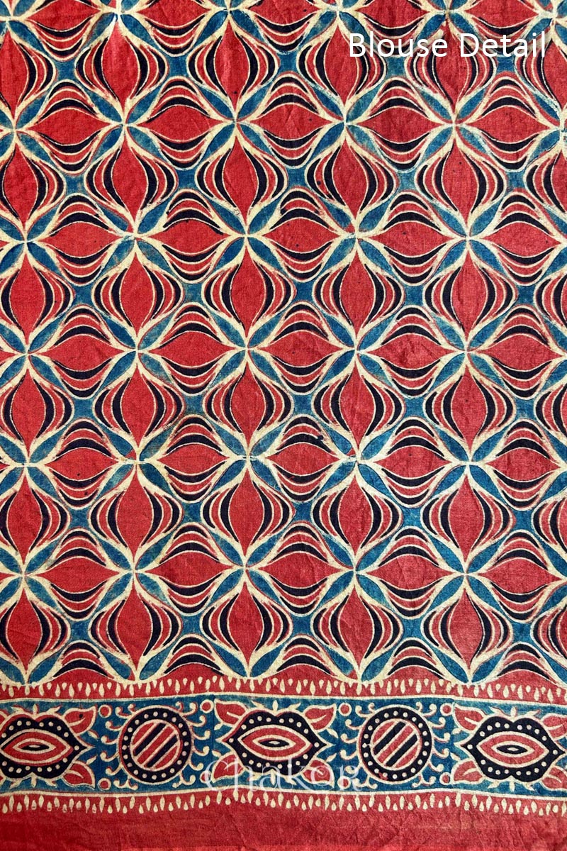 Close up of Green Bandhani Saree with Ajrakh printed border and pallu in pure gaji silk with traditional bandhej tie-dye, handcrafted in Kutch. 