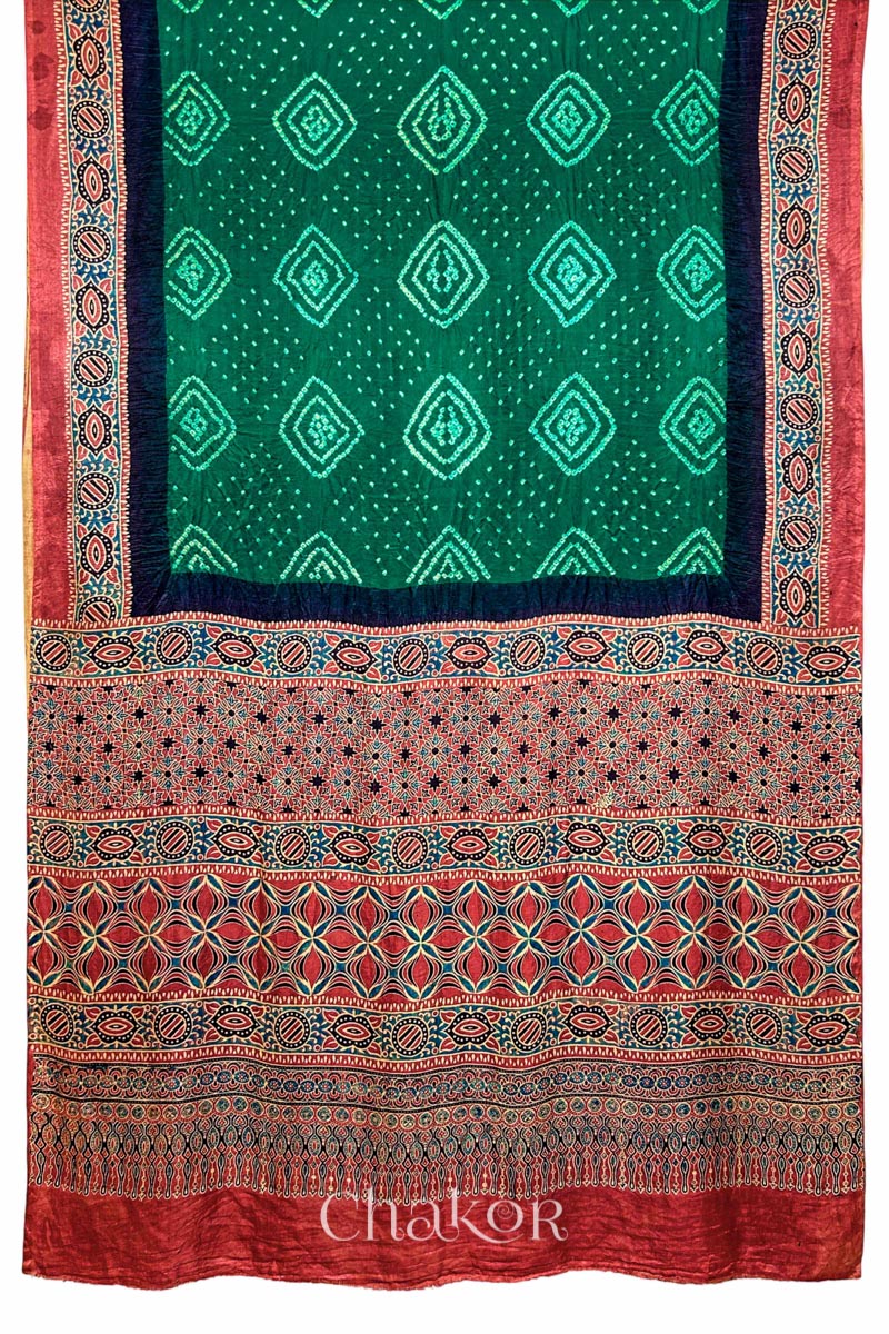 Green Bandhani Saree with Ajrakh printed border and pallu in pure gaji silk with traditional bandhej tie-dye, handcrafted in Kutch. 