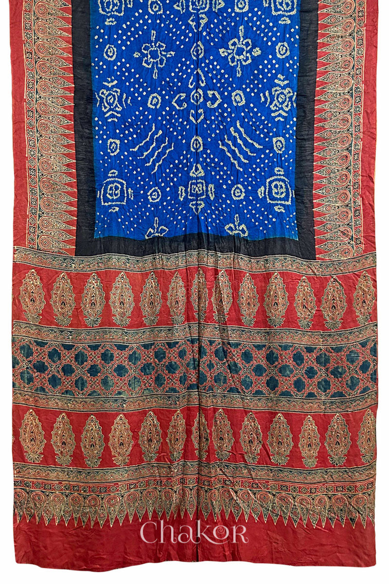 Full view of Blue Bandhani Saree with Natural Red Ajrakh printed border and pallu in pure gaji silk with traditional bandhej tie-dye, handcrafted in Kutch. 