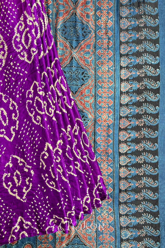 Close up of  Purple Bandhani Saree with Indigo Ajrakh printed pallu in pure gaji silk with traditional bandhej tie-dye, handcrafted in Kutch. 