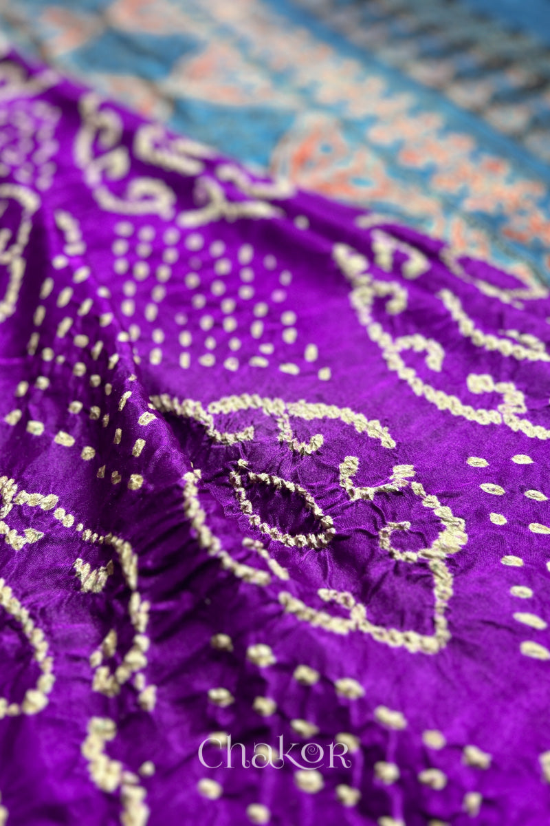 Close up of  Purple Bandhani Saree with Indigo Ajrakh printed pallu in pure gaji silk with traditional bandhej tie-dye, handcrafted in Kutch. 