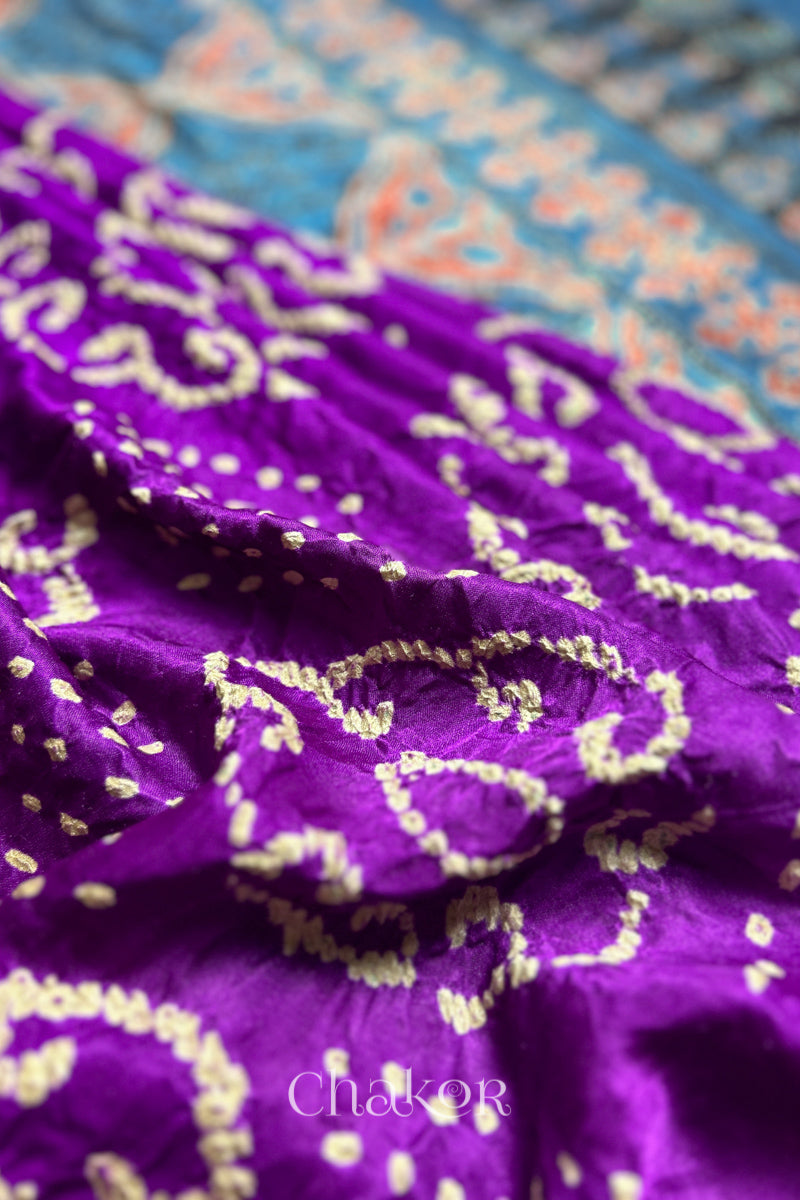 Close up of  Purple Bandhani Saree with Indigo Ajrakh printed pallu in pure gaji silk with traditional bandhej tie-dye, handcrafted in Kutch. 