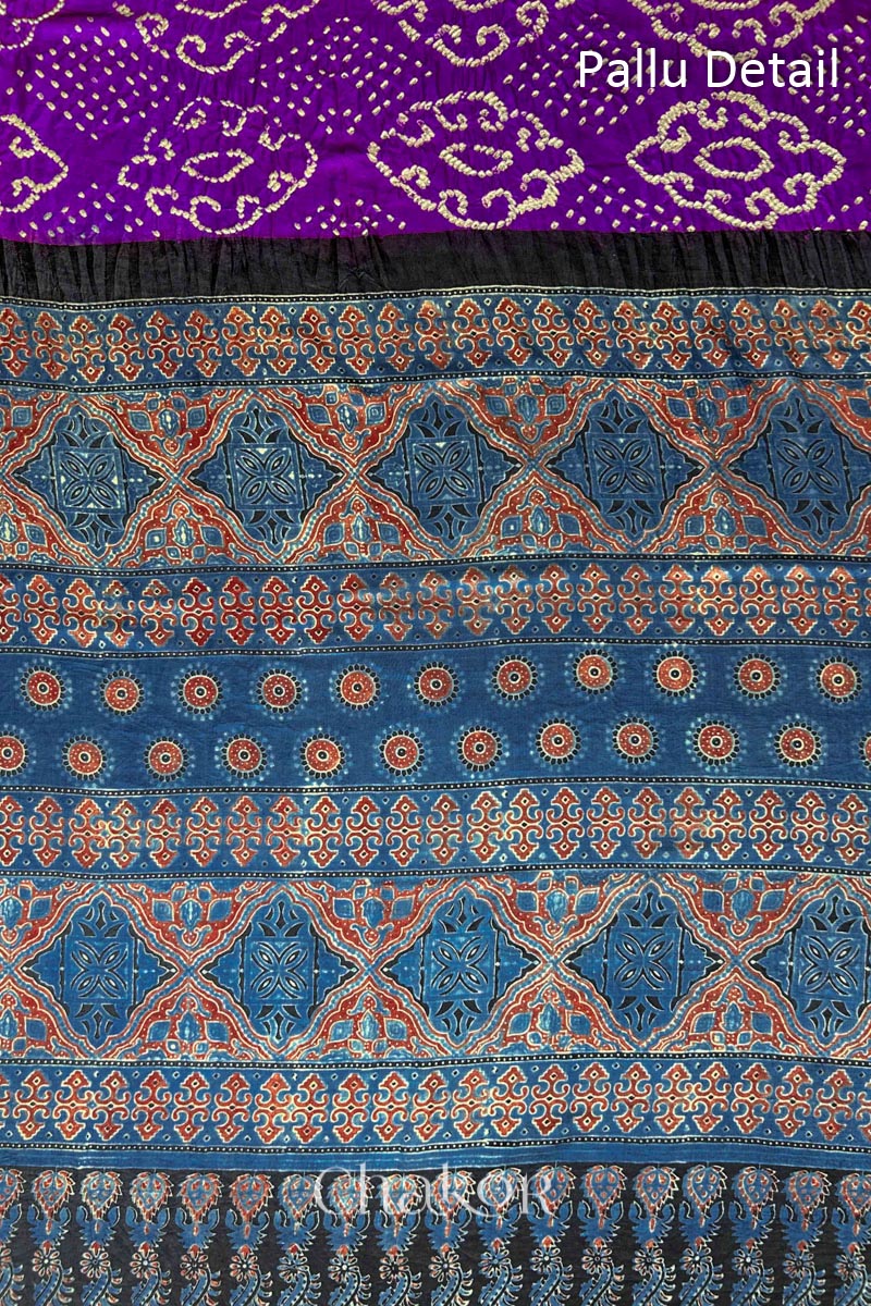 Close up of  Purple Bandhani Saree with Indigo Ajrakh printed pallu in pure gaji silk with traditional bandhej tie-dye, handcrafted in Kutch. 