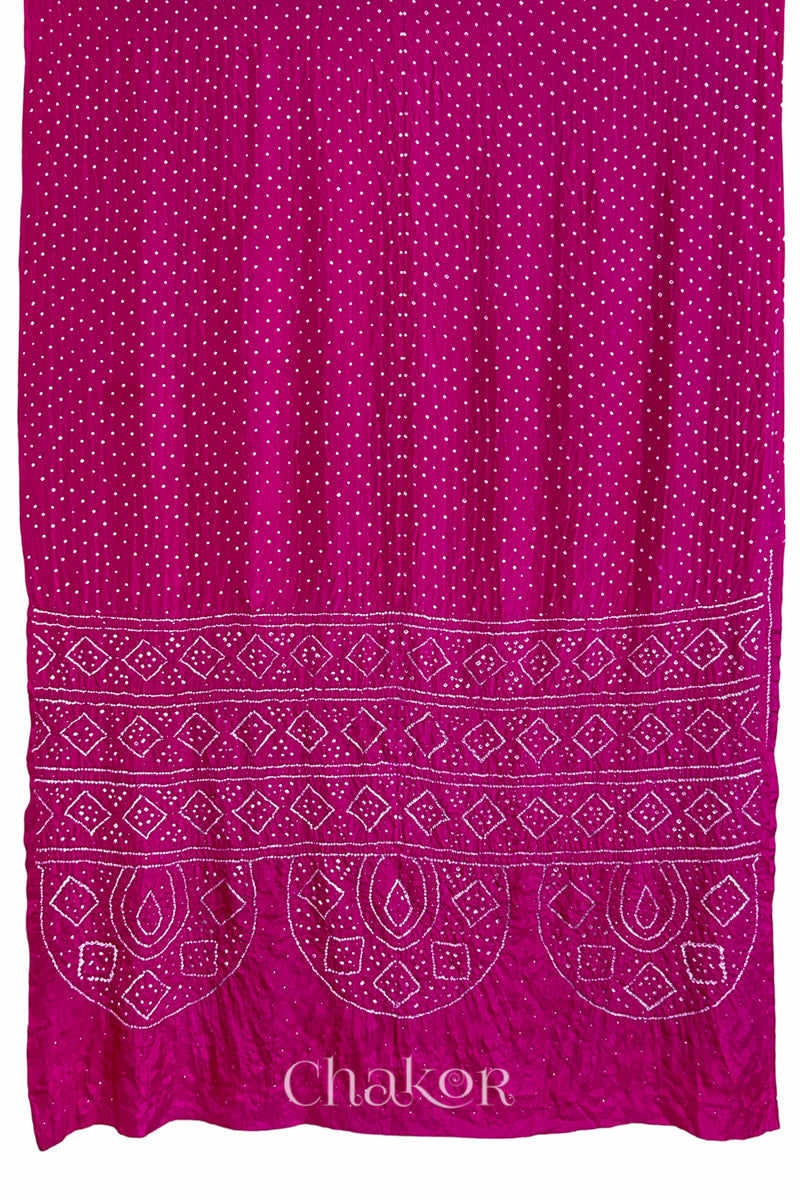 Full view of Rani pink Bandhani Mulberry Silk Saree, handcrafted in rai bandhej patterns with mukaish embroidery.