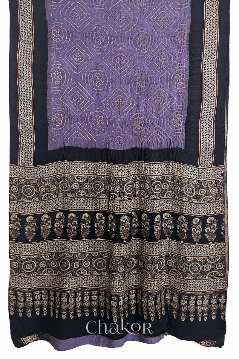 Full view of Mauve Bandhani Saree with Natural Black Ajrakh printed border and pallu in pure gaji silk with traditional bandhej tie-dye, handcrafted in Kutch. 