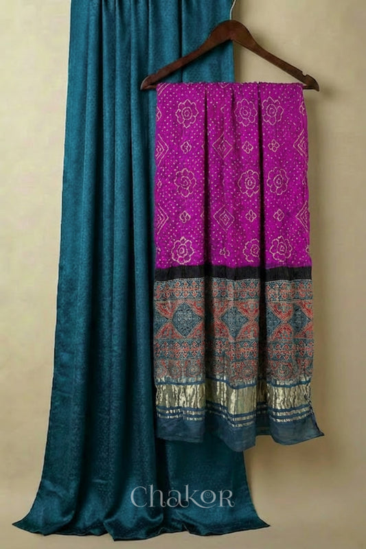 Dark Indigo mashru kurta set fabric paired with magenta pink bandhani gaji silk dupatta featuring ajrakh printed pallu.