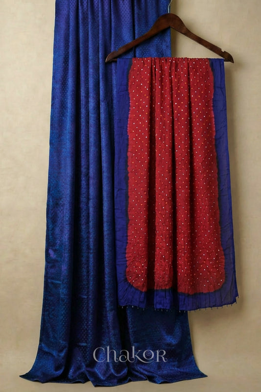 Royal Blue mashru silk kurta set fabric paired with red & navy bandhani mulberry silk dupatta featuring beads on edge.