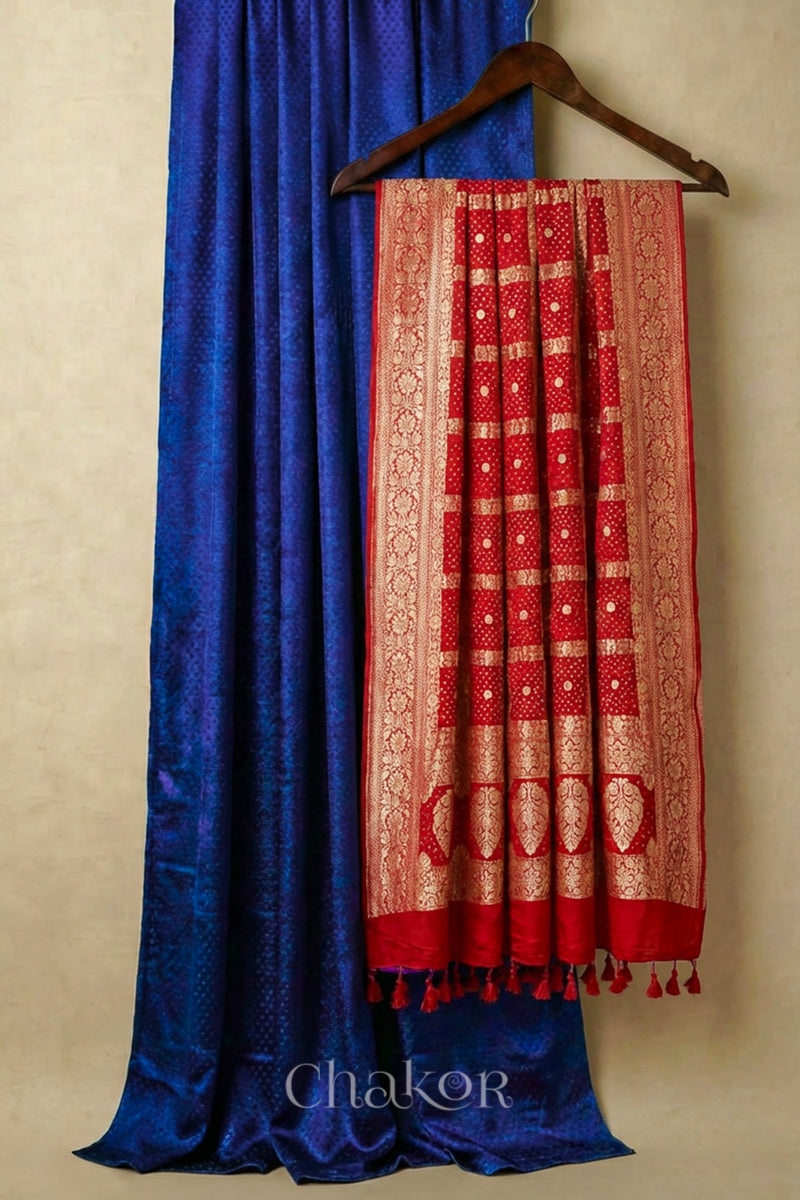 Royal Blue mashru silk kurta set fabric paired with red pure silk georgette bandhani banarasi dupatta featuring golden zari pallu & border.