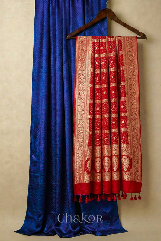 Royal Blue mashru silk kurta set fabric paired with red pure silk georgette bandhani banarasi dupatta featuring golden zari pallu & border.