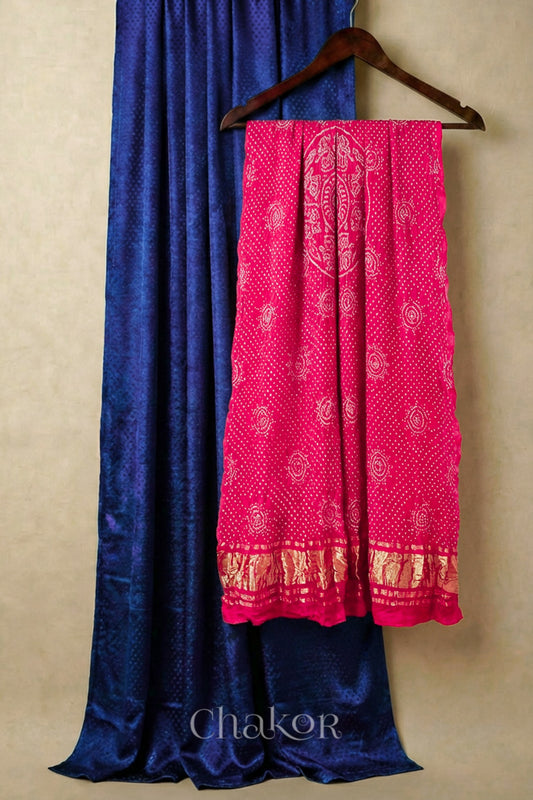 Royal Blue mashru silk kurta set fabric paired with coral bandhani gaji silk dupatta featuring golden zari pallu.