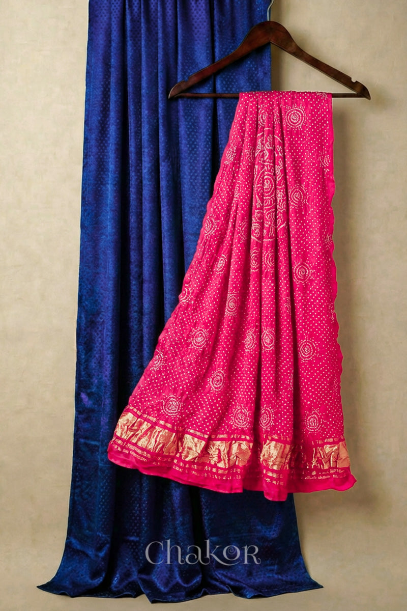 Royal Blue mashru silk kurta set fabric paired with coral bandhani gaji silk dupatta featuring golden zari pallu.