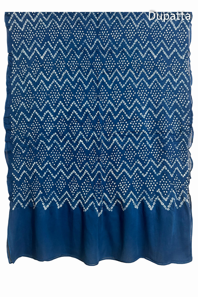 Full view of the indigo blue dupatta from the kurta set with intricate zigzag bandhani patterns, with Chakor logo. The design showcases artisanal craftsmanship.
