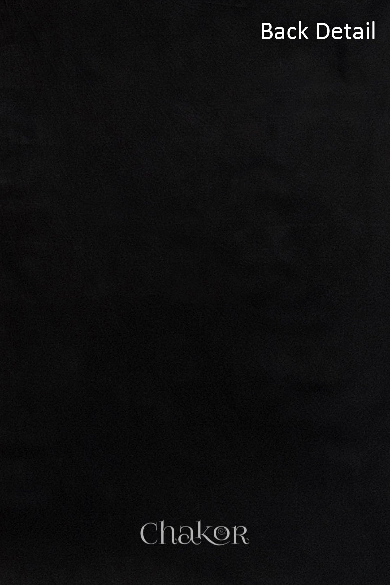 Close-up of plain back of the kurta fabric with Chakor brand logo. Text reads back detail.
