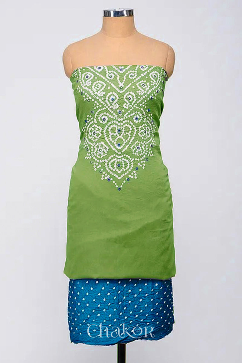 A stylish fabric featuring a mehendi green mirror embroidered top, a bandhani turquoise blue bottom. Text reads Chakor.
