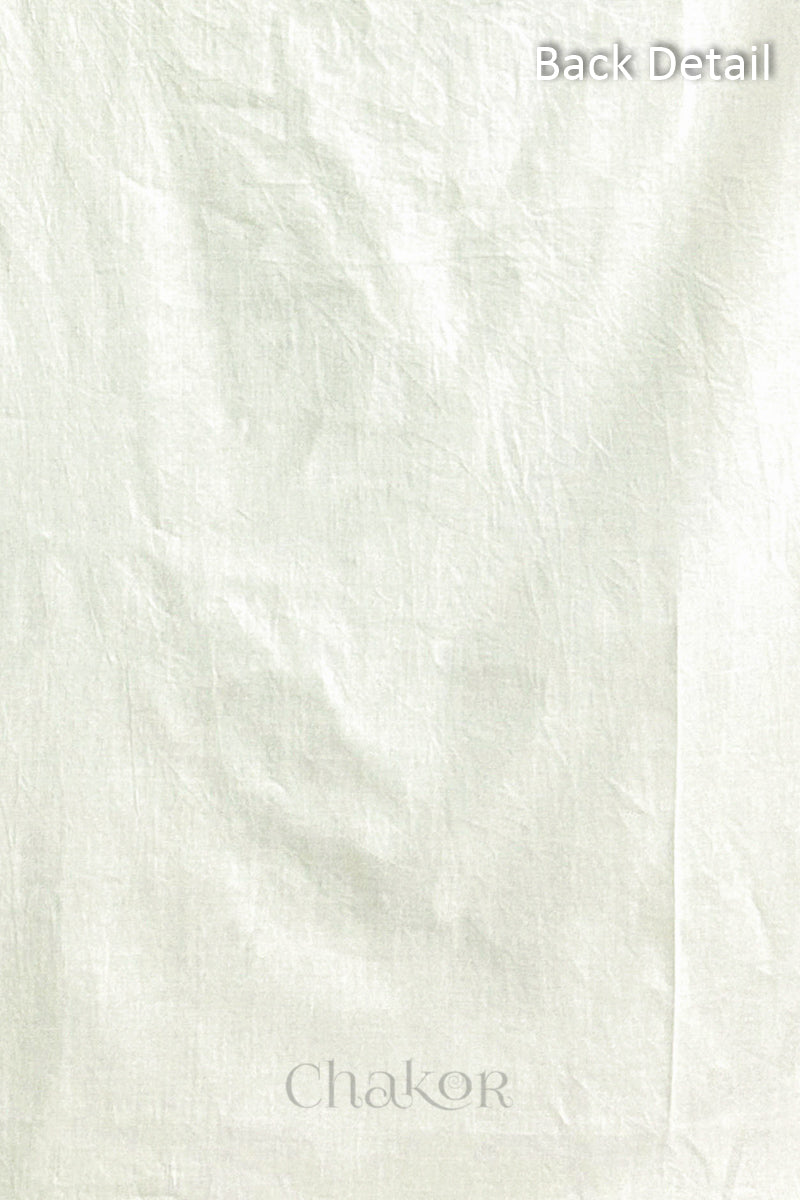 Close-up of plain back of the kurta fabric with Chakor brand logo. Text reads back detail.
