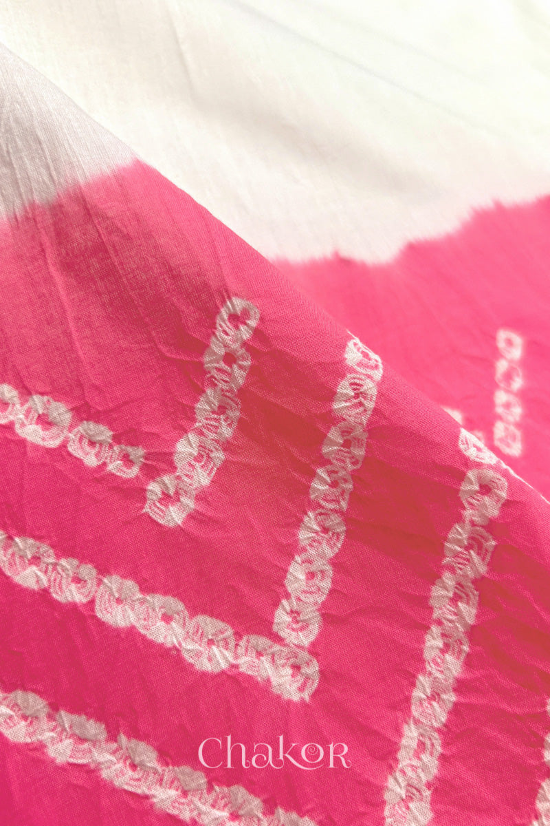 Close-up of bandhani fabric featuring chevron tie-dye design, with Chakor brand logo. Text reads sleeve details.
