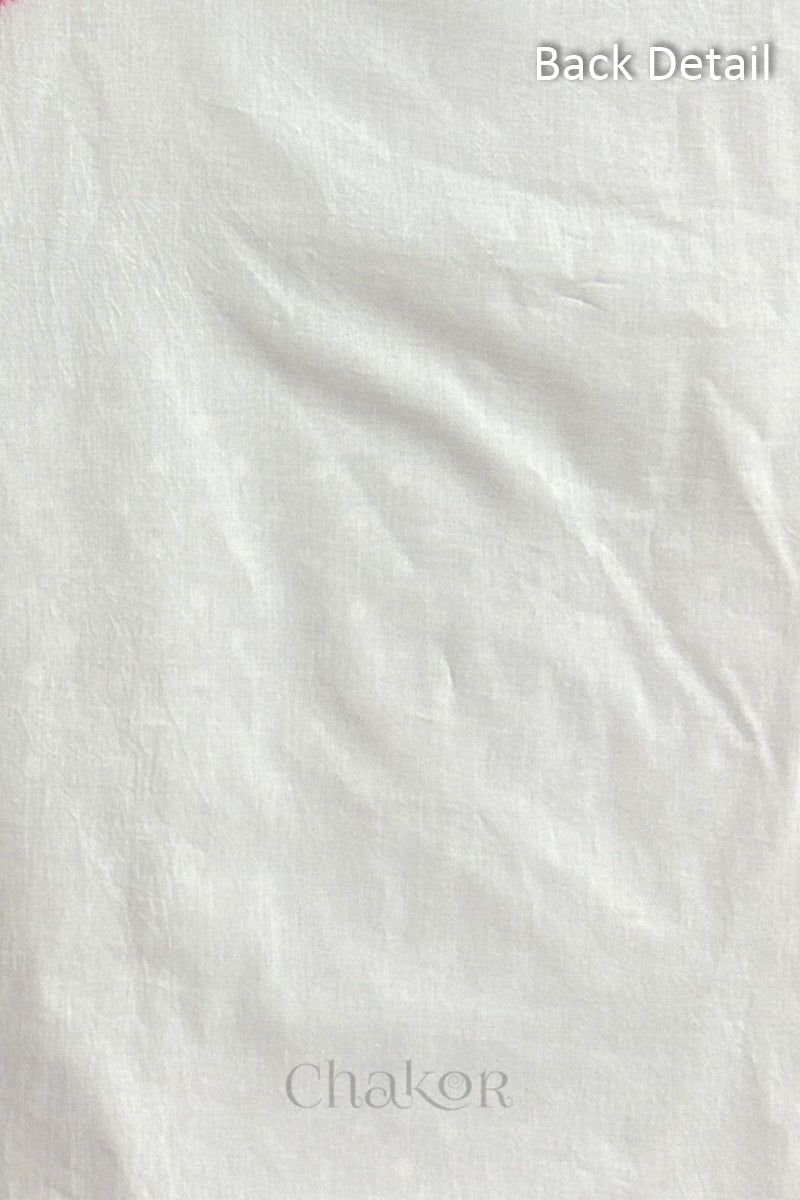 Close-up of plain back of the kurta fabric with Chakor brand logo. Text reads back detail.