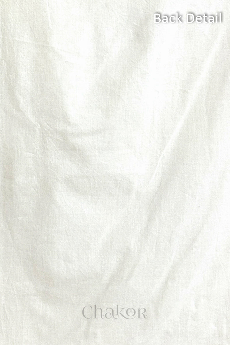 Close-up of plain back of the kurta fabric with Chakor brand logo. Text reads back detail.
