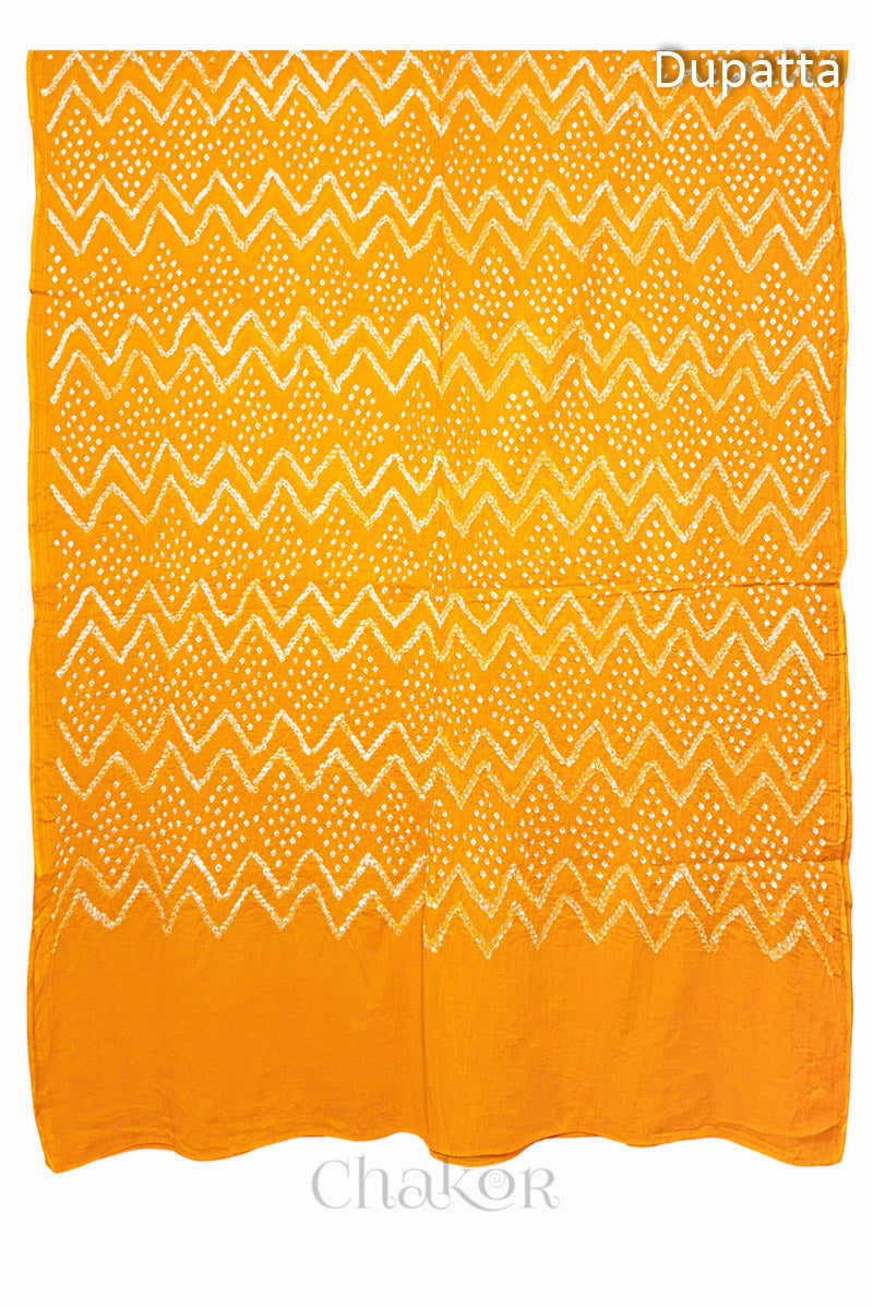 Full view of the dupatta from the kurta set with intircate zigzag bandhani patterns,  with Chakor logo. The design showcases artisanal craftsmanship.