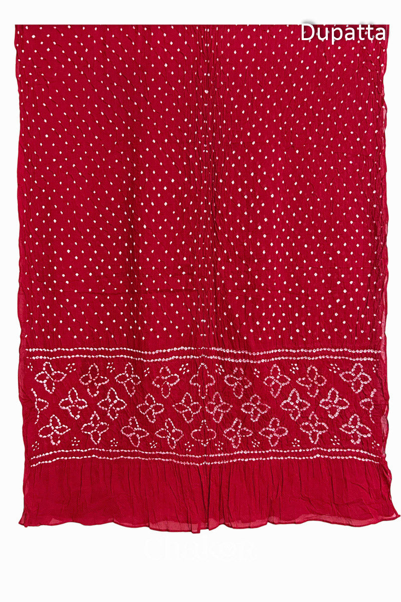 Full view of Red Bandhani mulmul cotton dupatta with floral pallu and dotted body pattern.
